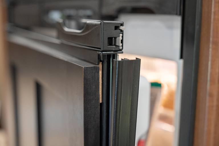 Plastic trim on freezer door