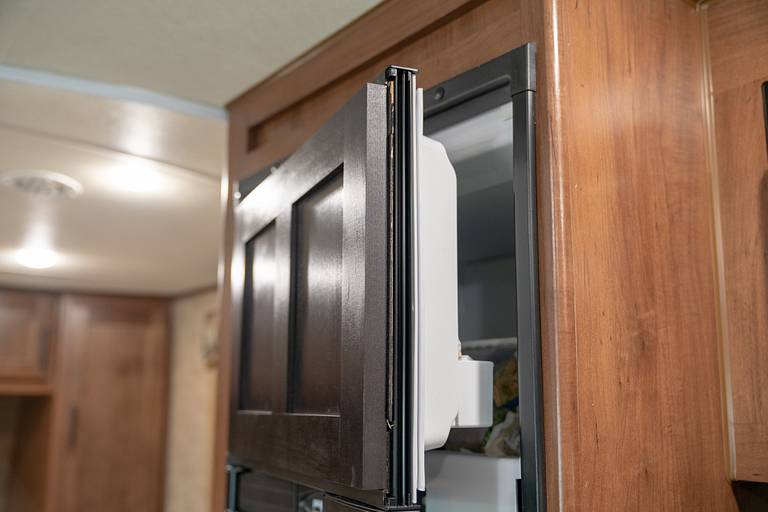 RV freezer door removal